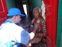 Dr. Narayan examining a 95-year-old women in Tokha, a quake victim, Kathmandu
